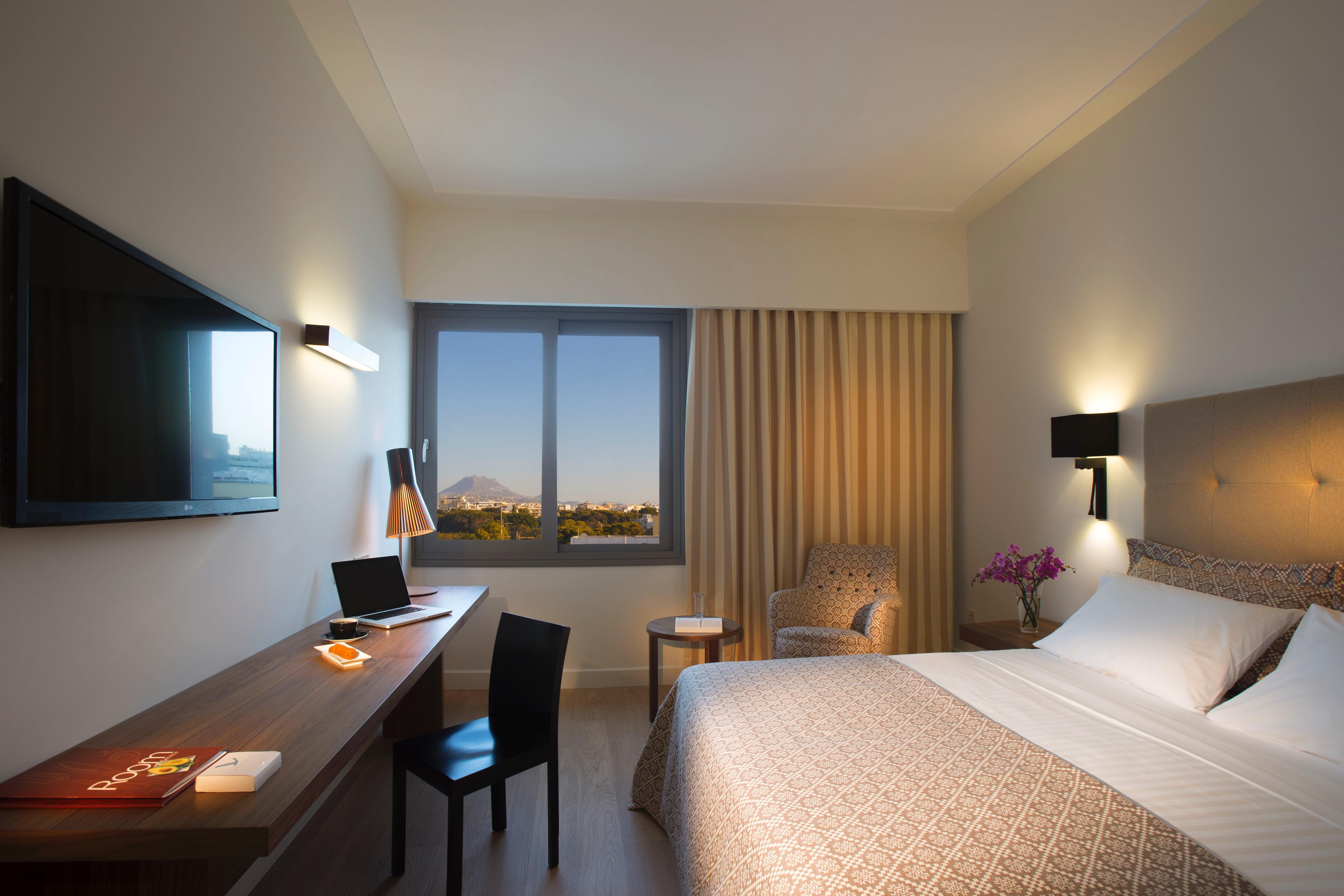 Aquila Atlantis Hotel Kandiye Dış mekan fotoğraf A room at the Athens Hilton