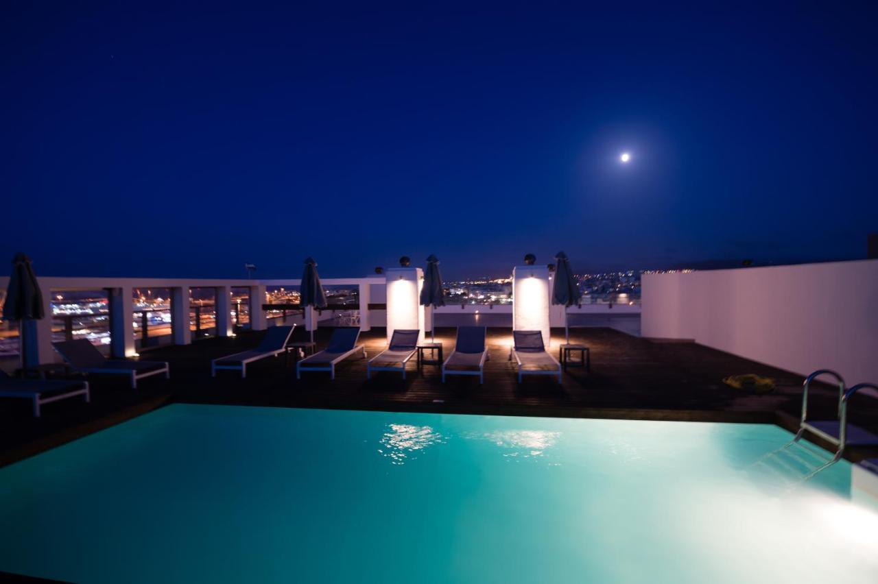 Aquila Atlantis Hotel Kandiye Dış mekan fotoğraf Rooftop pool at the Hotel